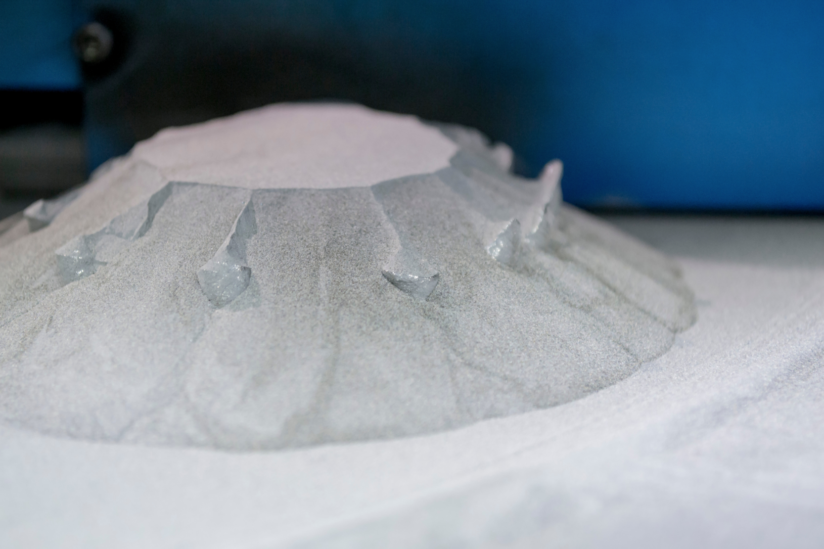 Metal powder like that shown here is but one of many materials used to build 3D-printed parts.